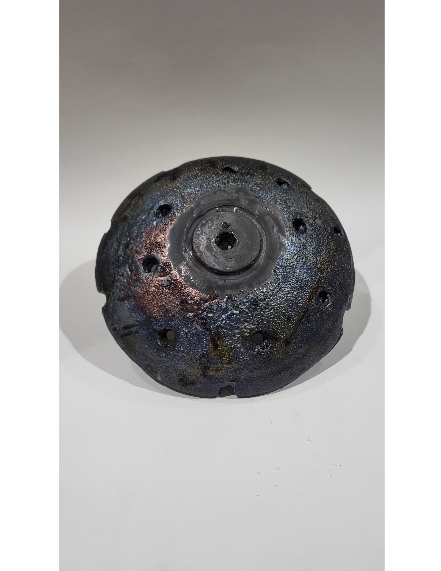 Glazed ceramic artwork with vibrant colors